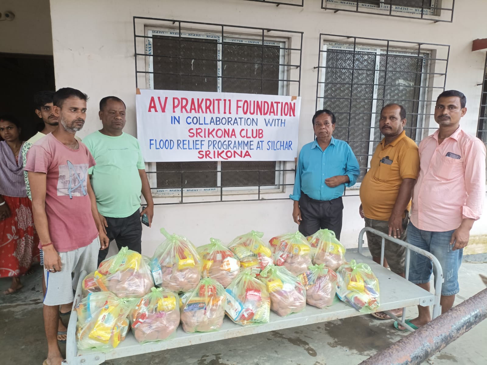 Prakritii Foundation volunteers distributing essentials